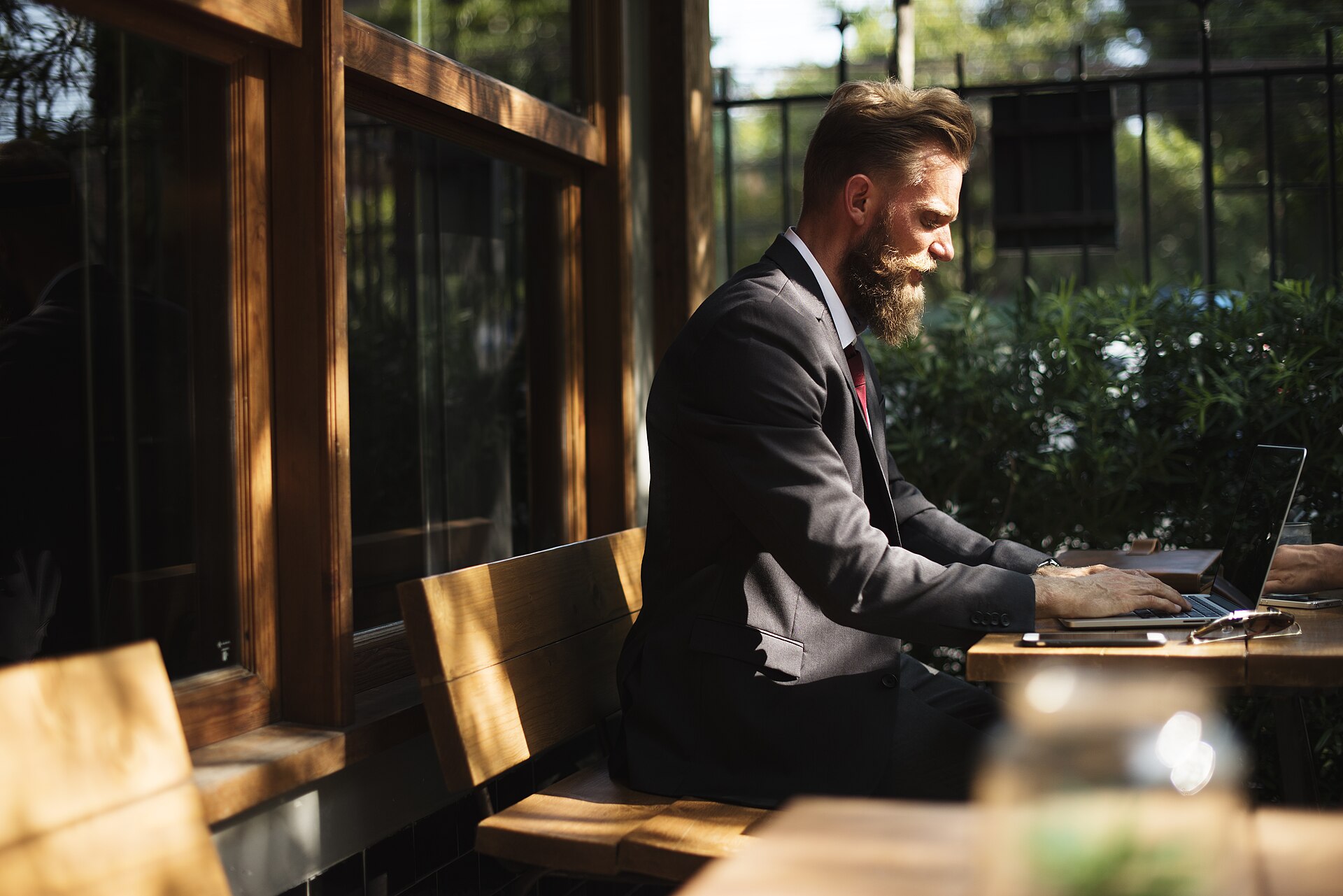 Person working on a laptop outdoors