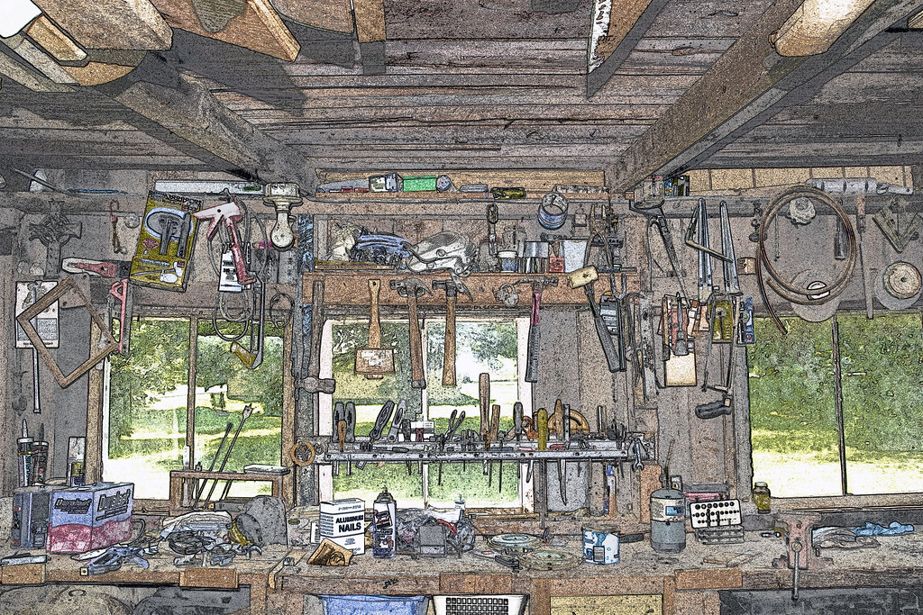 Woodworking shop floor with tools and workbenches